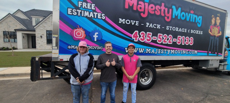 Majesty moving crew with truck behind